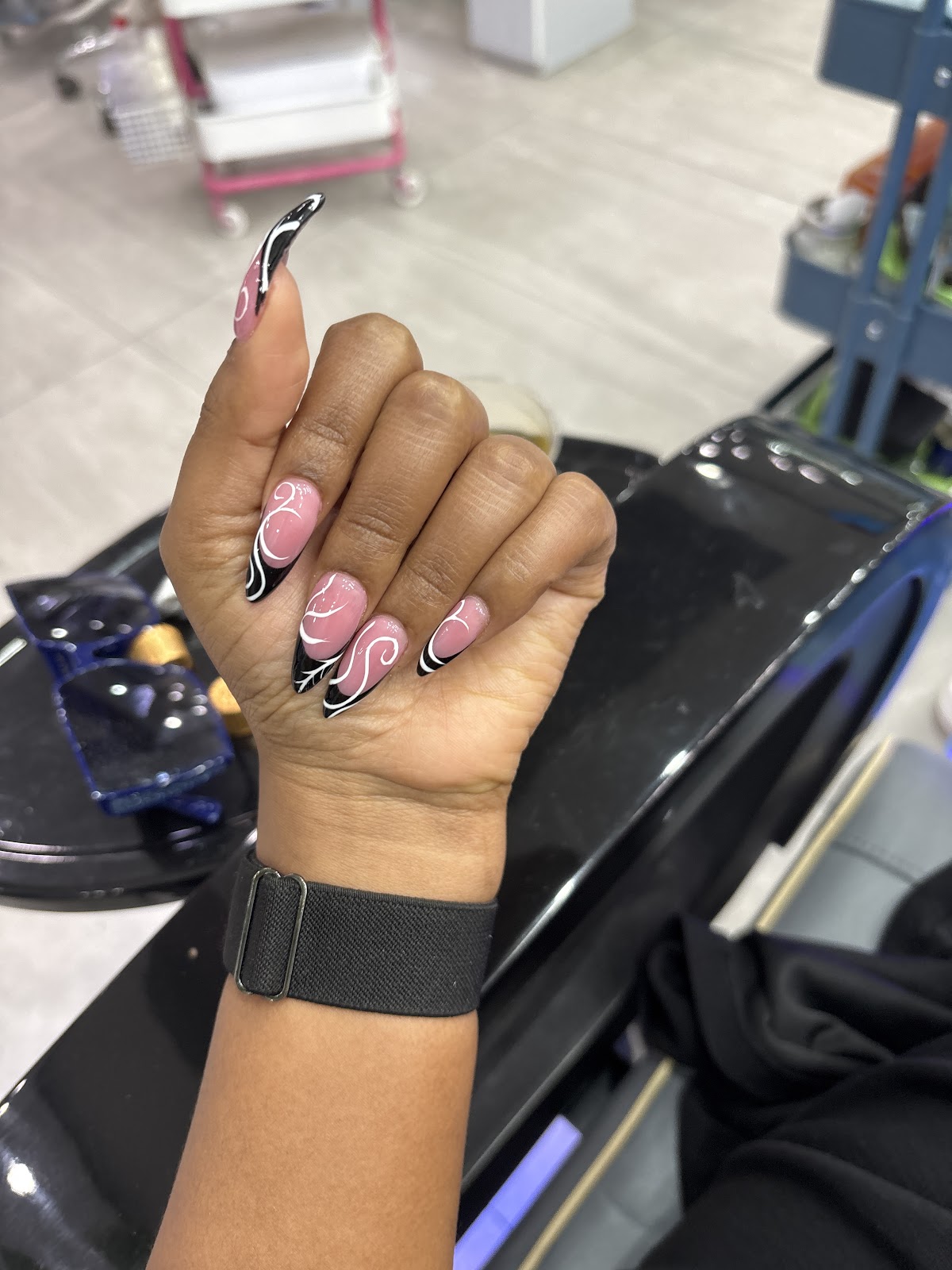 Black and white swirl French tip stiletto nails